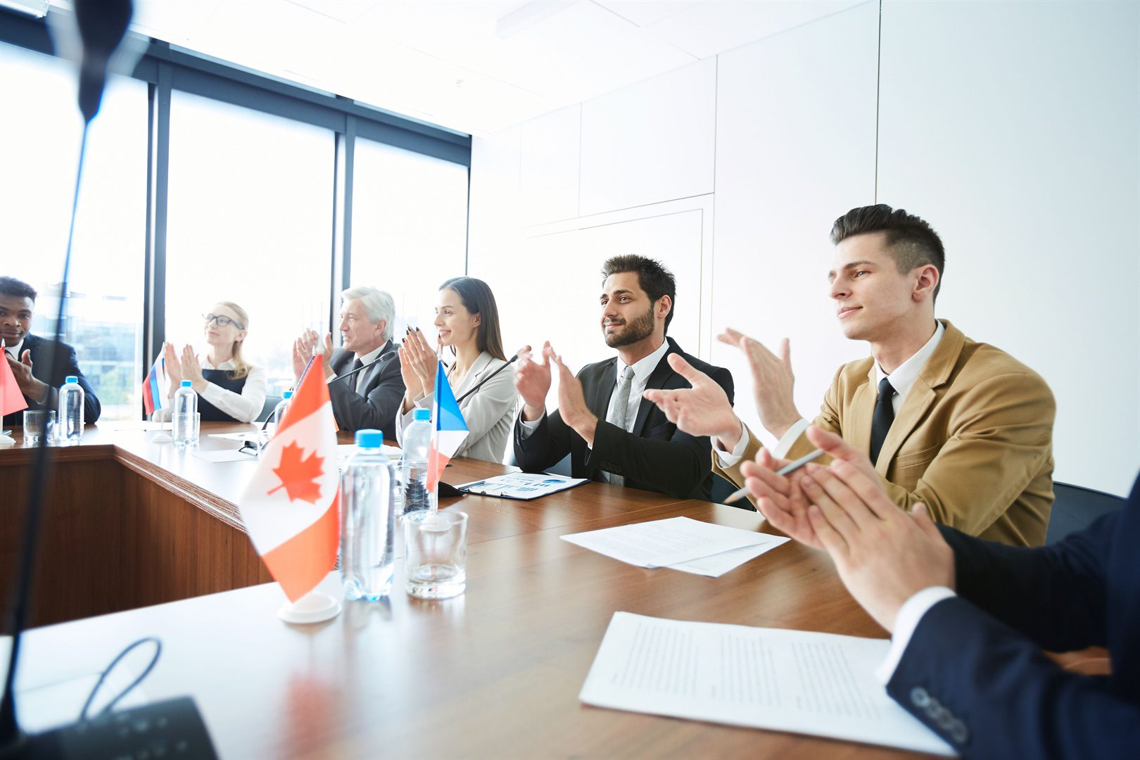 politicians-applauding-at-meeting